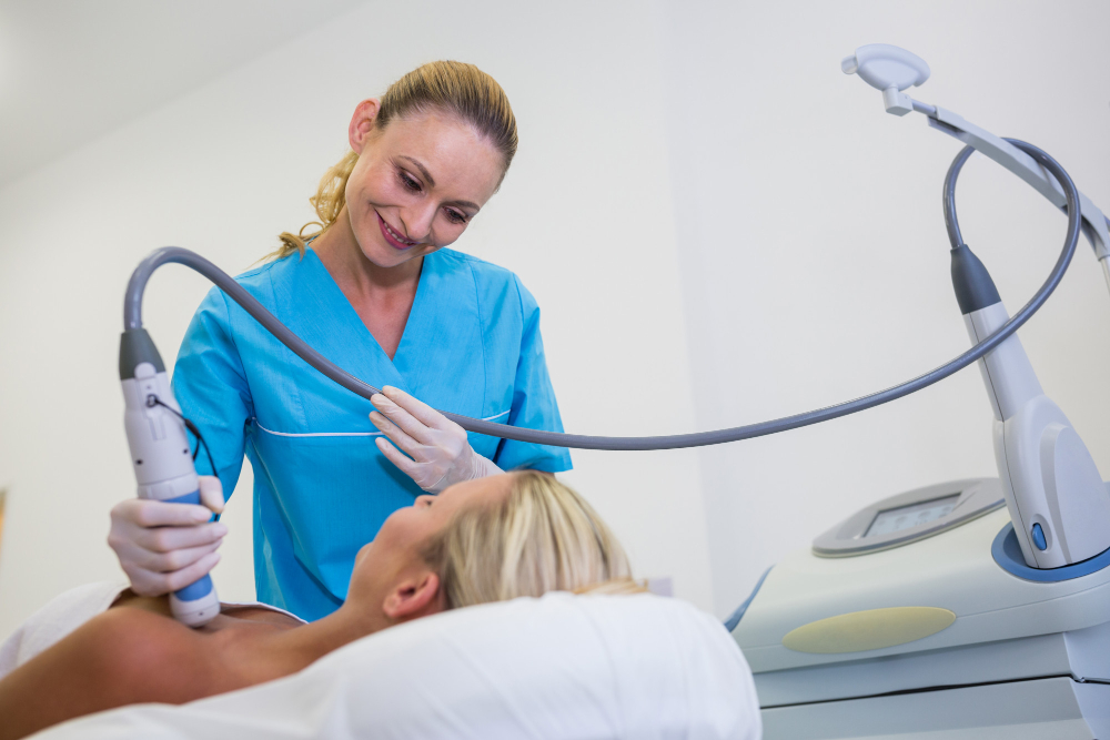 woman receiving laser epilation treatment her body